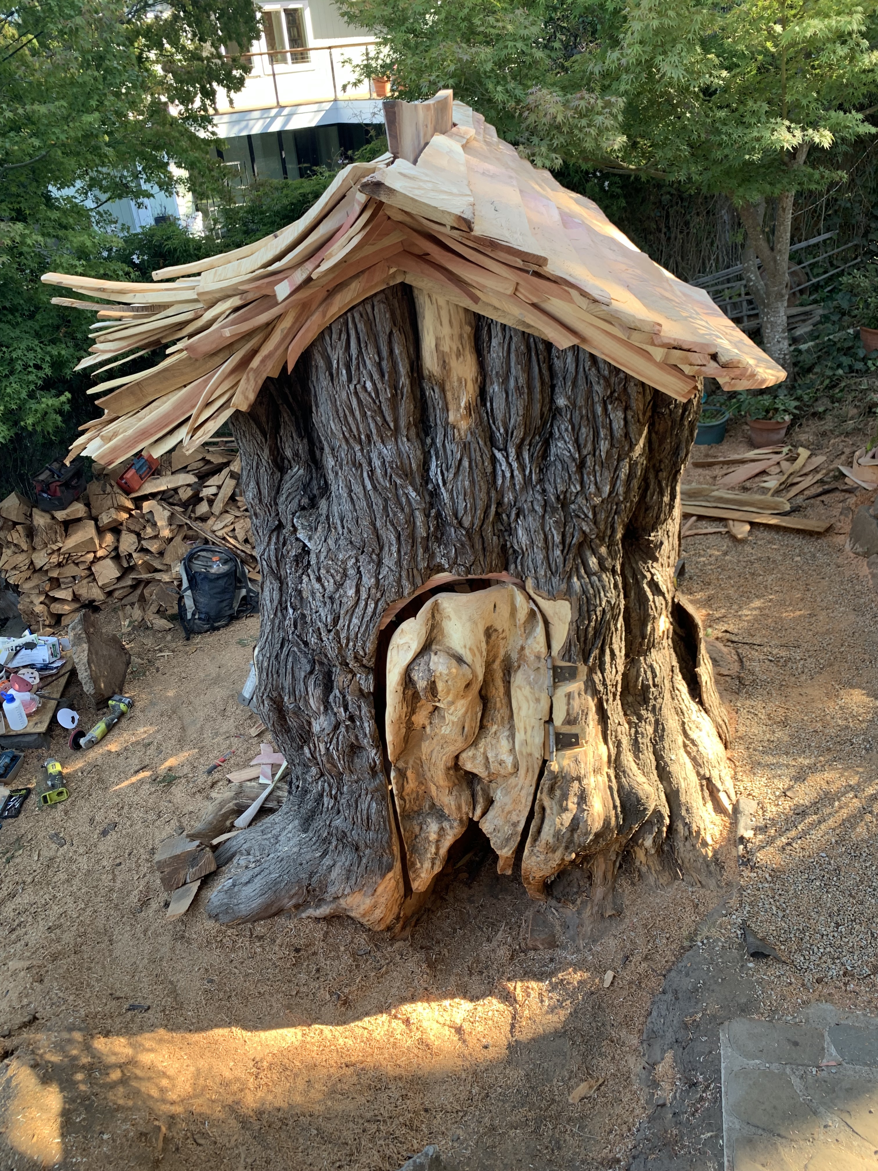 Month 6, functional door, window and wood burning stove + seating.